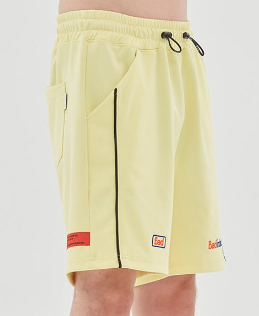 ベドインベド(BADINBAD) TRACK HALF SHORTS_LIME YELLOW