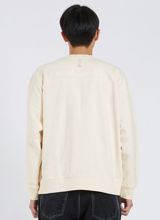 NOMANUAL(ノーマニュアル) REVERSED TM LOGO SWEATSHIRT - CREAM