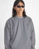 NOMANUAL(ノーマニュアル) LOGO PATCHED WARM-UP TOP - REFLECTIVE