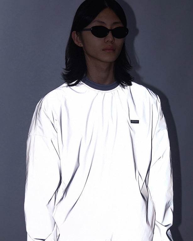 NOMANUAL(ノーマニュアル) LOGO PATCHED WARM-UP TOP - REFLECTIVE