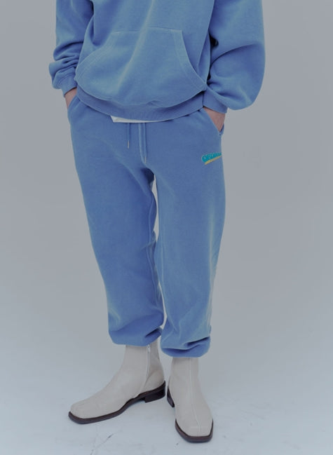 ORDINARY PEOPLE(オーディナリーピープル)   VINTAGE LOGO PURPLE PIGMENT SWEATPANTS