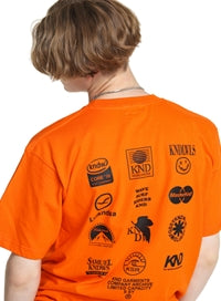 KND(ケイエンド) LOGO ARCHIVE GRAPHIC T-SHIRT ORANGE
