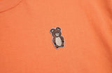 AQO_studiospace(アコスタジオスペース)  AQO SMALL ERIC BEAR T-SHIRTS LIGHT ORANGE