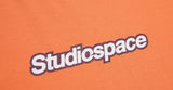 AQO_studiospace(アコスタジオスペース) AQO T-SHIRTS WITH LOGO LIGHT ORANGE