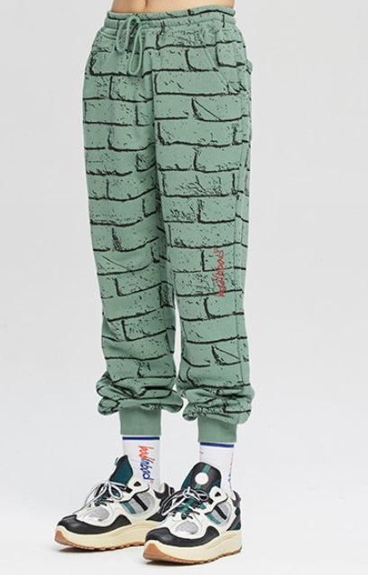 ベドインベド(BADINBAD)  BRICK GRAFFITI SWEATPANTS_SAGE GREEN