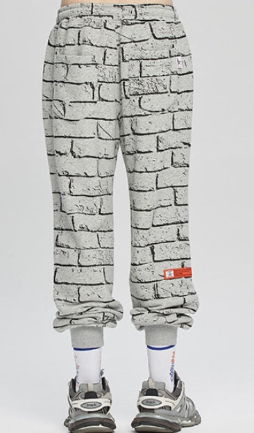 ベドインベド(BADINBAD) BRICK GRAFFITI SWEATPANTS_GREY – UNDERSTUDY