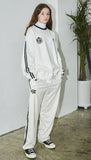 オーワイ(OY)  	WIDE TAPE RING TRACK PANTS-CREAM