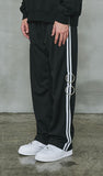 オーワイ(OY)  	WIDE TAPE RING TRACK PANTS-BLACK