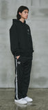 オーワイ(OY)  	WIDE TAPE RING TRACK PANTS-BLACK