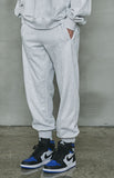 オーワイ(OY)  	UNBALANCE JOGGER PANTS-LIGHT GREY