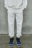 オーワイ(OY)  	UNBALANCE JOGGER PANTS-WHITE