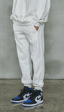 オーワイ(OY)  	UNBALANCE JOGGER PANTS-WHITE