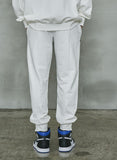 オーワイ(OY)  	UNBALANCE JOGGER PANTS-WHITE