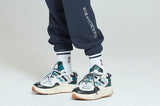ロマンティッククラウン(ROMANTIC CROWN) STRIPE BANDING JOGGER PANTS_NAVY