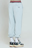 ロマンティッククラウン(ROMANTIC CROWN) STRIPE BANDING JOGGER PANTS_SKY BLUE