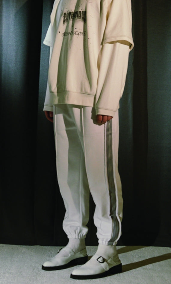 ORDINARY PEOPLE(オーディナリーピープル) DESTROYED SIDE BAND POINT WHITE SWEATPANTS