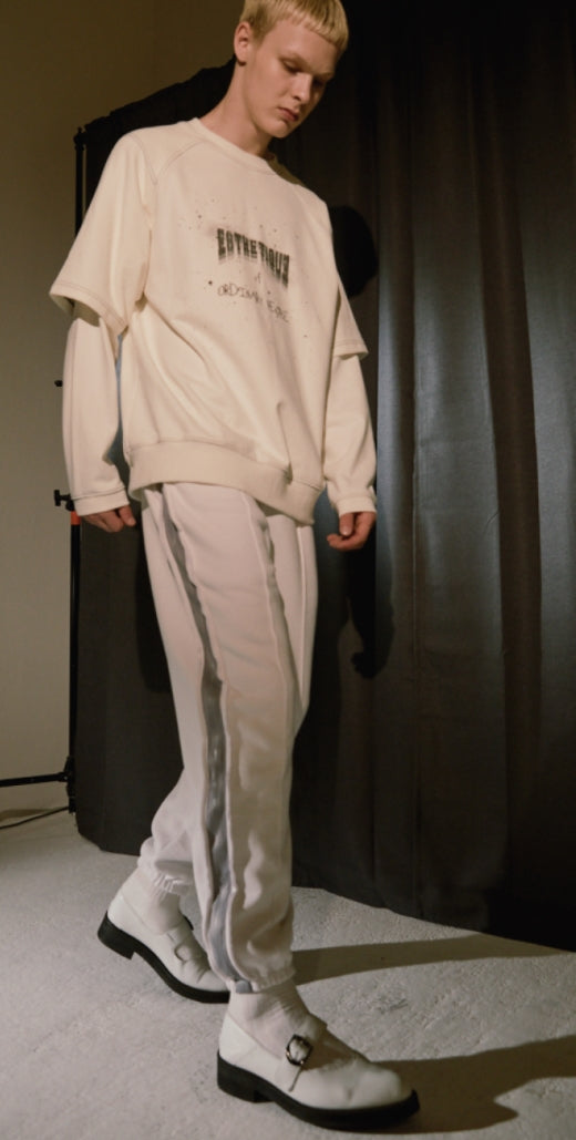 ORDINARY PEOPLE(オーディナリーピープル) DESTROYED SIDE BAND POINT WHITE SWEATPANTS