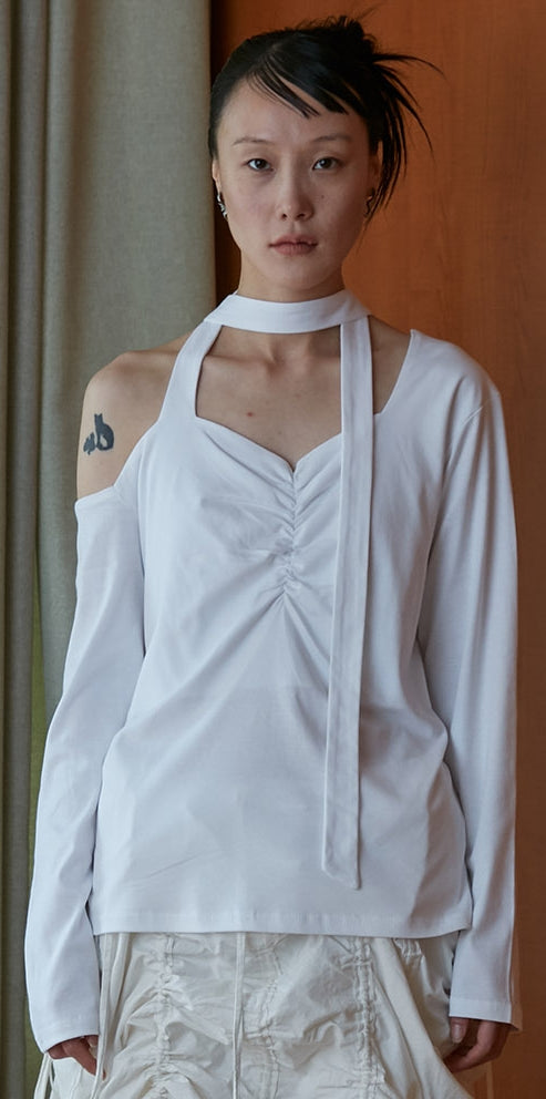 nache(ナチェ) string t-shirt