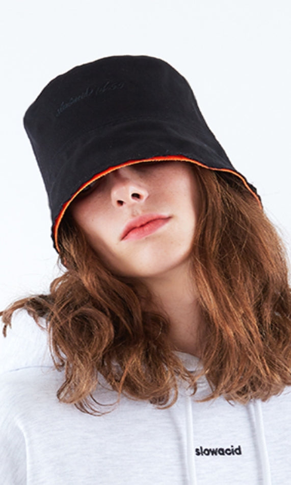 スローアシッド(SLOW ACID) Lettering Cutting Bucket Hat (BLACK/ORANGE)