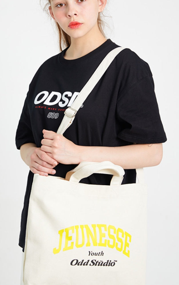 Odd Studio (オッドスタジオ)　JEUNESSE × ODD STUDIO COLLABORATION LOGO ECO CROSS BAG - WHITE / YELLOW