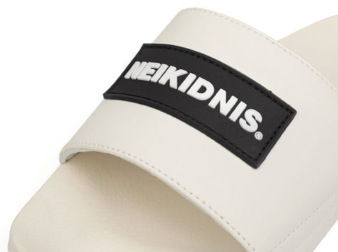 ネイキドニス(NEIKIDNIS)  RUBBER LOGO SLIDE / IVORY