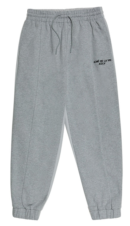 アクメドラビ(acme' de la vie)   MULTICUT TRAINING PANTS MELANGE