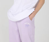 ワンダービジター(WONDER VISITOR)  Happy Logo jogger pants [Lilac]