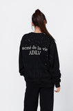 アクメドラビ(acme' de la vie) ADLV BABY FACE SWEATSHIRT BLACK BINOCULARS