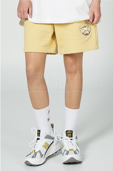 アクメドラビ(acme' de la vie) SILICON EMBLEM LOGO SHORT PANTS LIGHT YELLOW