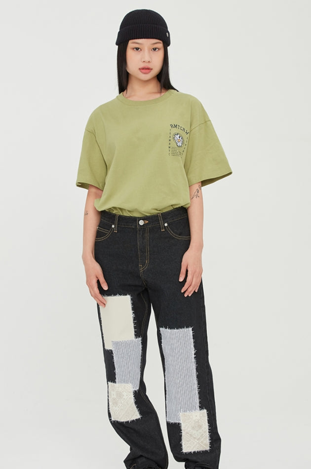 ロマンティッククラウン(ROMANTIC CROWN) FLOWER FACE SLOGAN TEE_LIGHT KHAKI