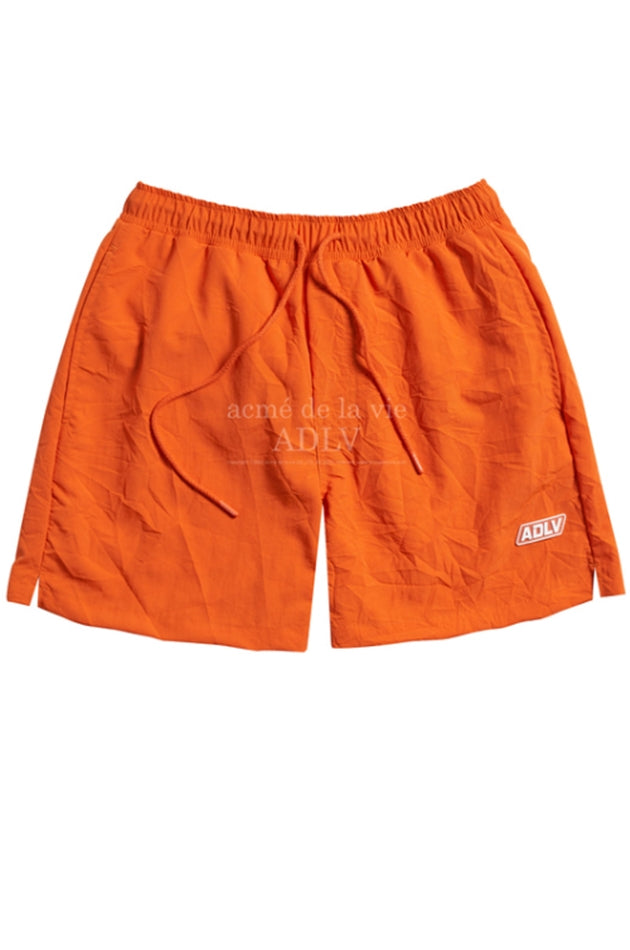 アクメドラビ(acme' de la vie)  WASHER NYLON SWIM PANTS ORANGE