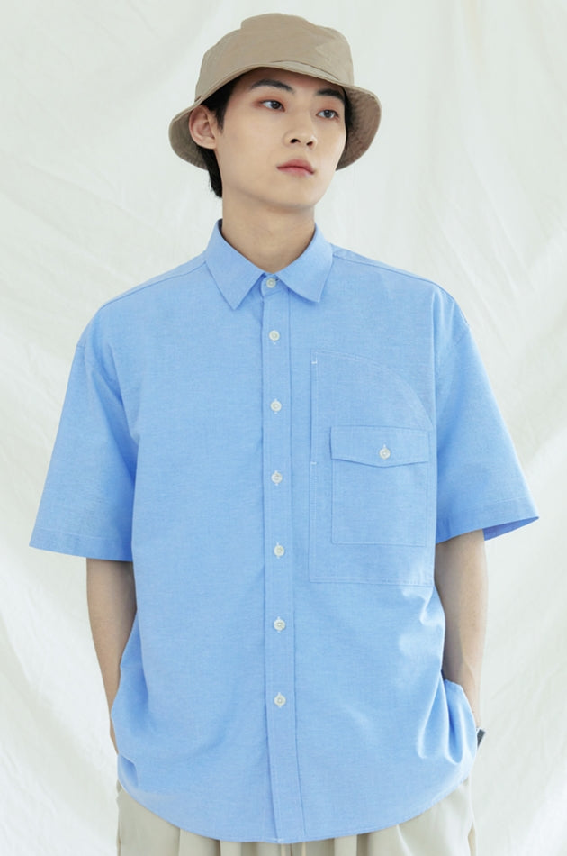 KND(ケイエンド) UTILITY CURVED POCKET OXFORD 1/2 SHIRT SKYBLUE