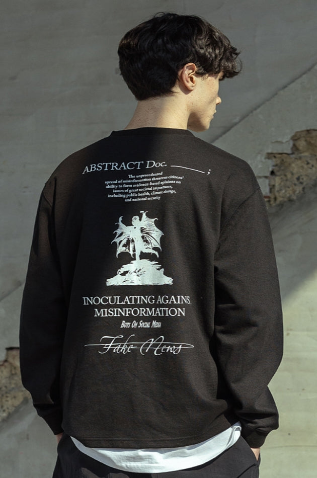 マスノウン(MASSNOUN)  FAKENEWS TURNCOAT CREWNECK MSOLS002-BK