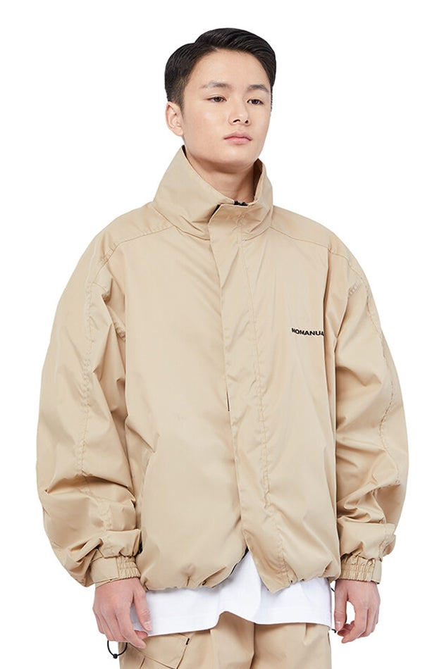NOMANUAL(ノーマニュアル)  FD WINDBREAKER JACKET - BEIGE