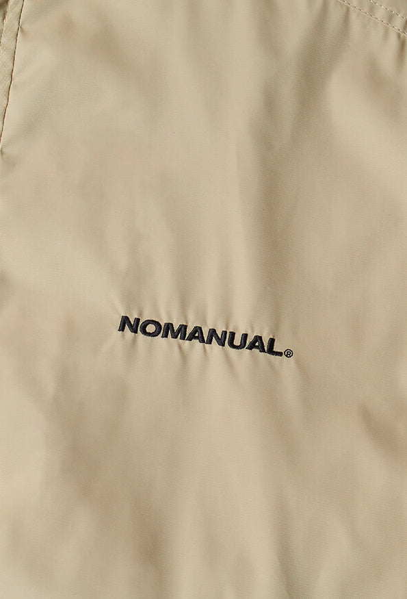 NOMANUAL(ノーマニュアル)  FD WINDBREAKER JACKET - BEIGE