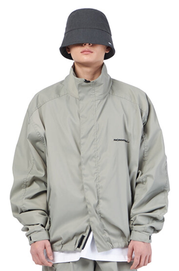 NOMANUAL(ノーマニュアル)  FD WINDBREAKER JACKET - WARM GRAY