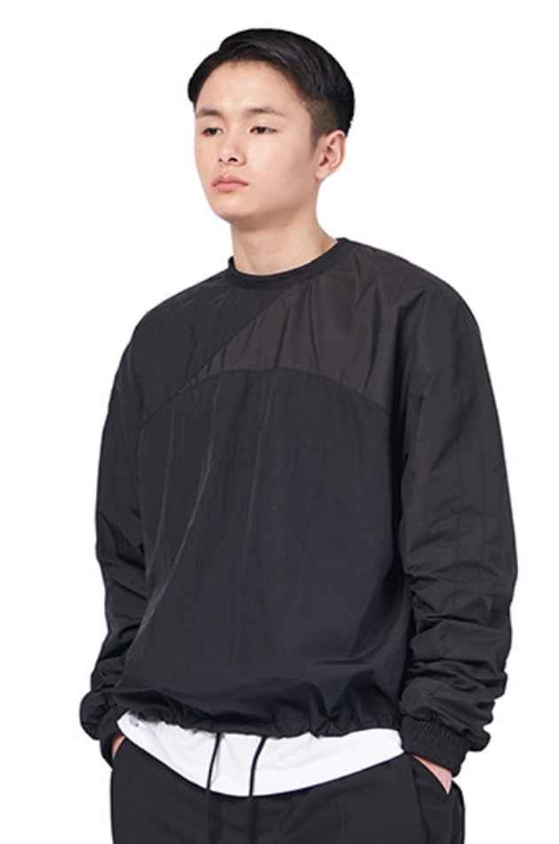 NOMANUAL(ノーマニュアル) SLICED WARM-UP TOP - BLACK