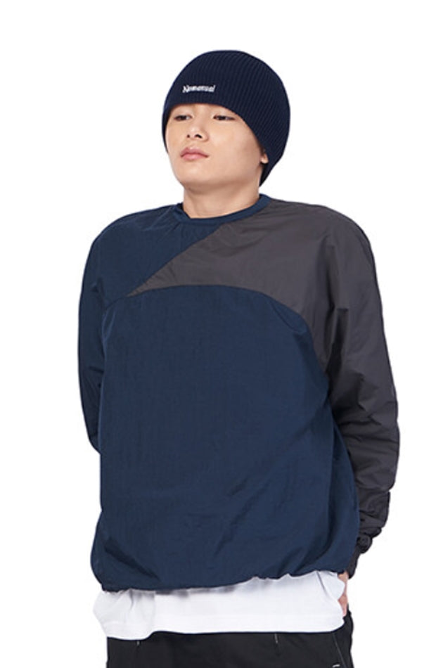 NOMANUAL(ノーマニュアル) SLICED WARM-UP TOP - NAVY