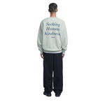 NOMANUAL(ノーマニュアル)  SLOGAN SWEATSHIRT - LIGHT KHAKI