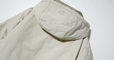 ダブルユーブイプロジェクト(WV PROJECT) Woven Hooded Coach Jacket Beige JIOT7540