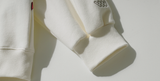 ダブルユーブイプロジェクト(WV PROJECT) Baseline Hood Zip Up Cream JIOT7536