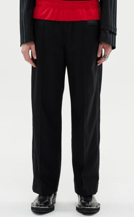 MMIC(エムエムアイシー) RAWCUT TRACK SLACKS