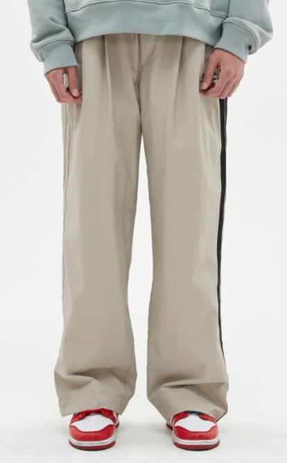 MMIC(エムエムアイシー) PLEATED WIDE TRACK PANTS