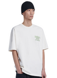 NOMANUAL(ノーマニュアル)  DOODLE LOGO T-SHIRT - CREAM