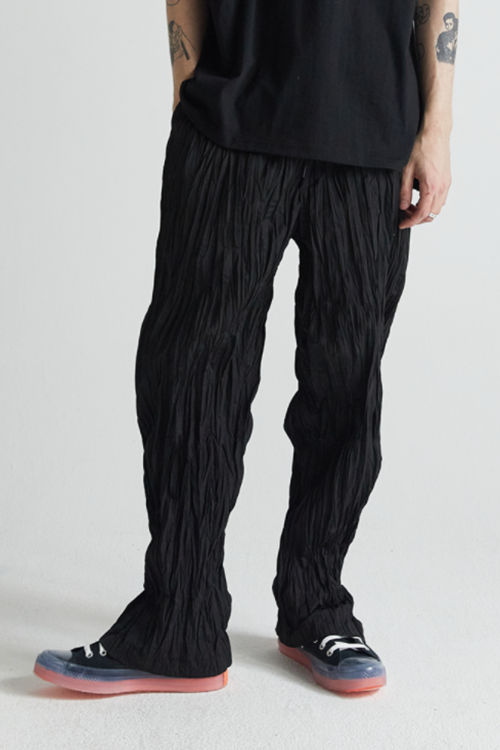 シディスコンマ(SHETHISCOMMA) CRUMBLE LOOSE PANTS