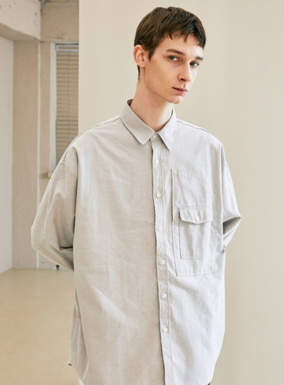 KND(ケイエンド) UTILITY CURVED POCKET OXFORD SHIRT SAND GREY