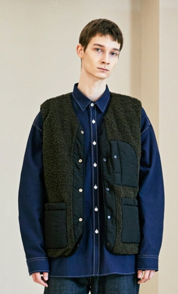 KND(ケイエンド)  REVERSIBLE BOA QUILTED PADDING VEST BLACK