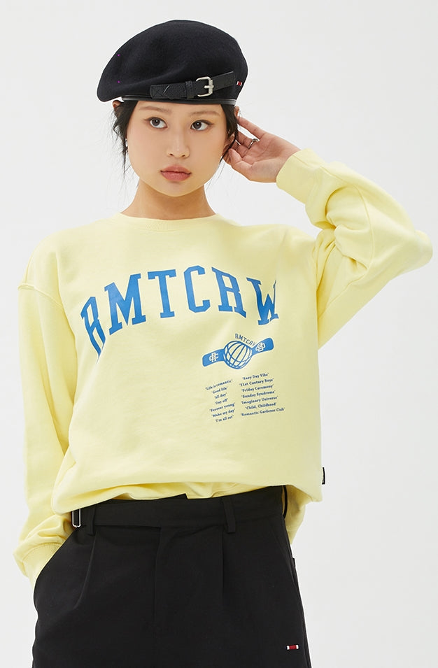 ROMANTIC CROWN(ロマンティック クラウン) GLOBE SLOGAN SWEAT SHIRT_LIGHT YELLOW
