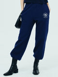 NCOVER（エンカバー）ROMAN TYPO LOGO TRAINING PANTS-NAVY