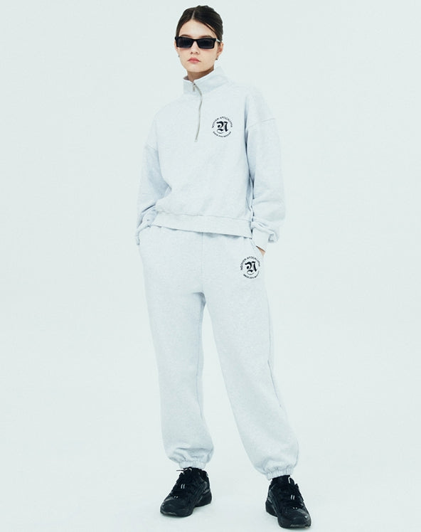 NCOVER（エンカバー）ROMAN TYPO LOGO TRAINING PANTS-WHITE MELANGE